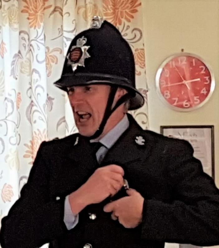 Preston Clare as The Policeman