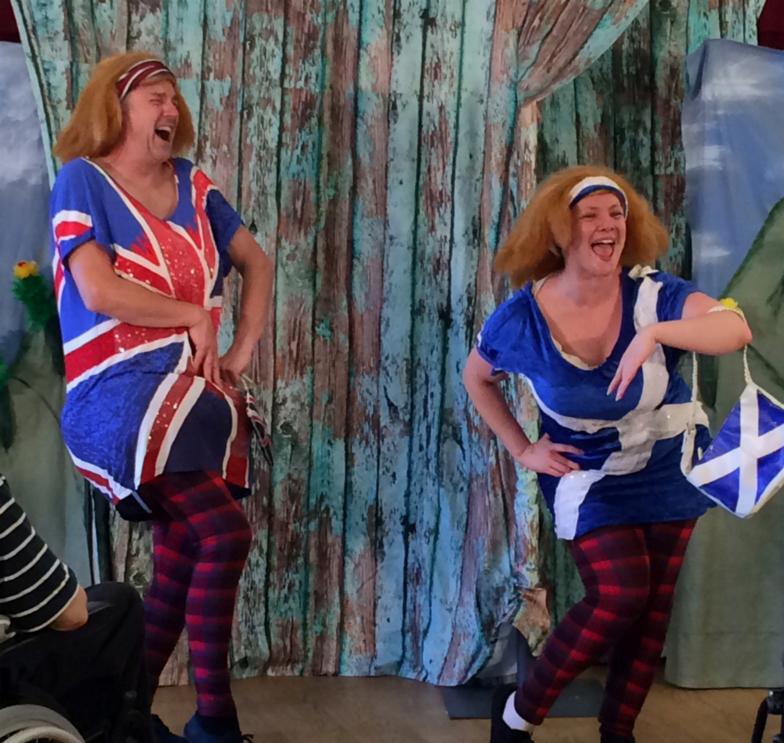 Preston Clare as Tweedle Dumfries and Lauren C Moore as Tweedle Dundee