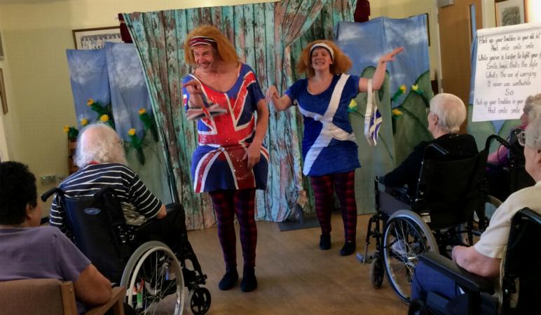 Preston Clare as Tweedle Dumfries and Lauren C Moore as Tweedle Dundee